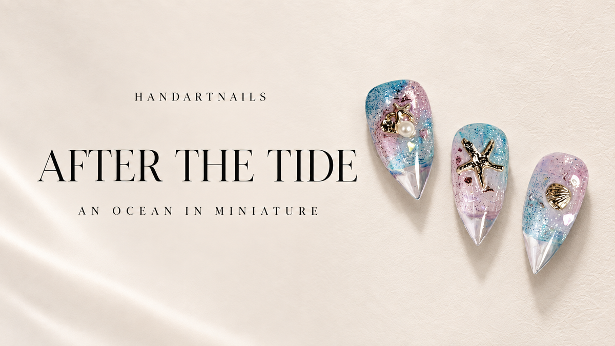After the Tide: pastel blue and pink marine charm nails on a warm ivory editorial cover.