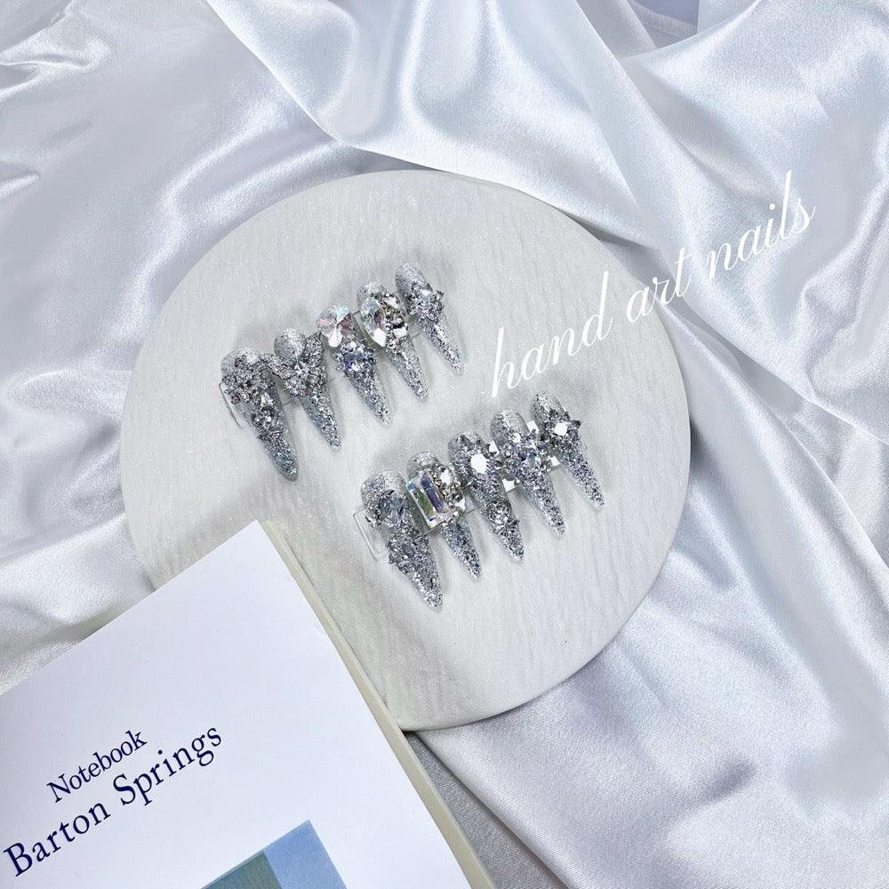 Luminous Muse soft romantic nail art