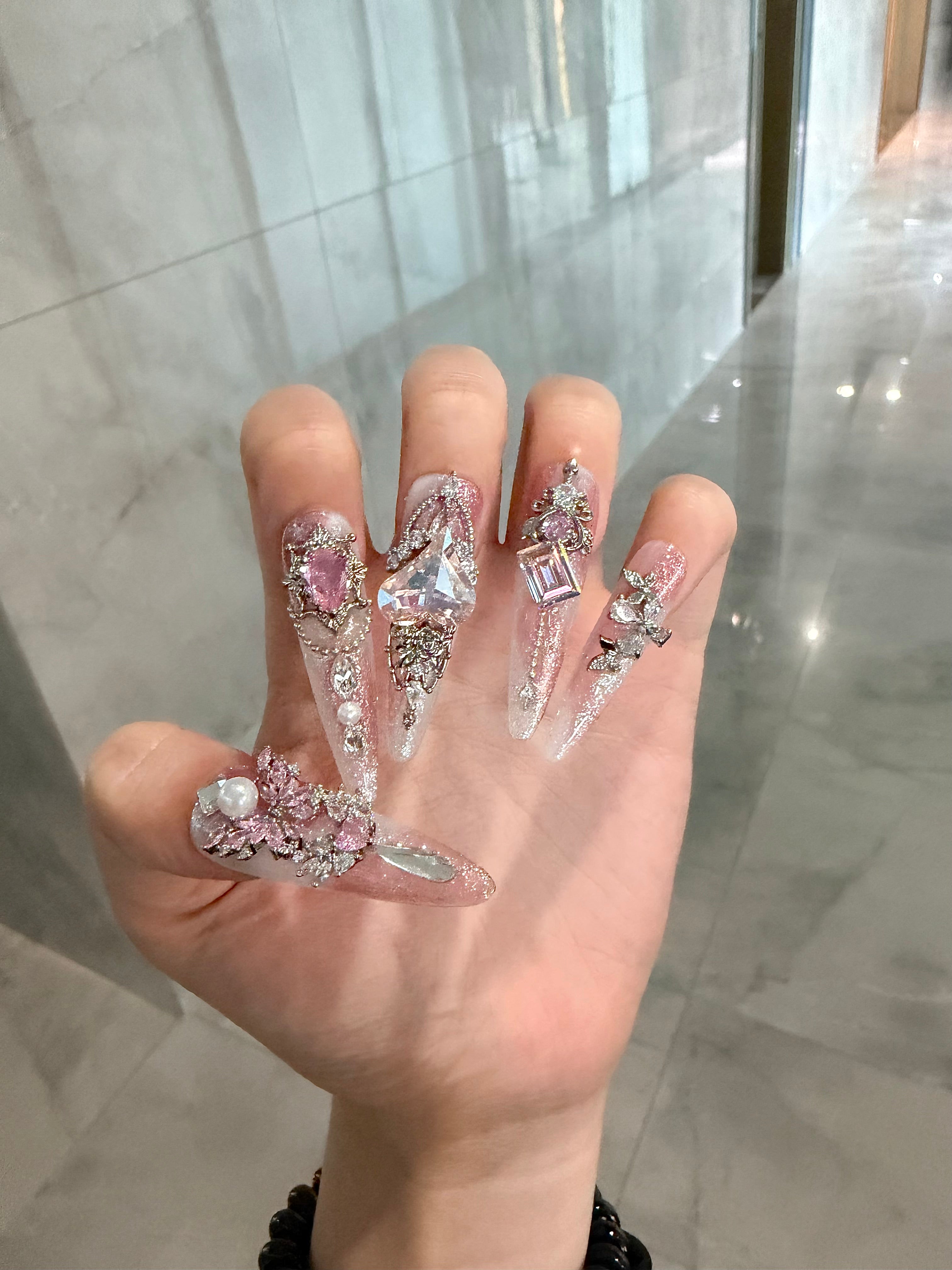 Pink crystal wearable nail art that feels special